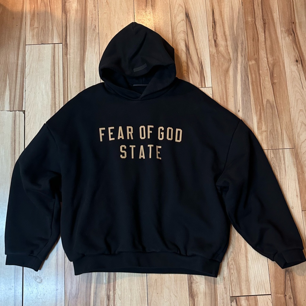 Fear of God Black Hoodie with Gold Lettering